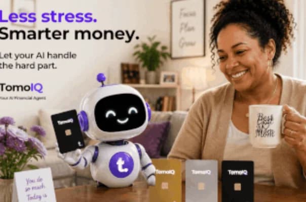 A woman smiling over coffee at home with the TomoIQ mascot and Tomo Cards on the table
